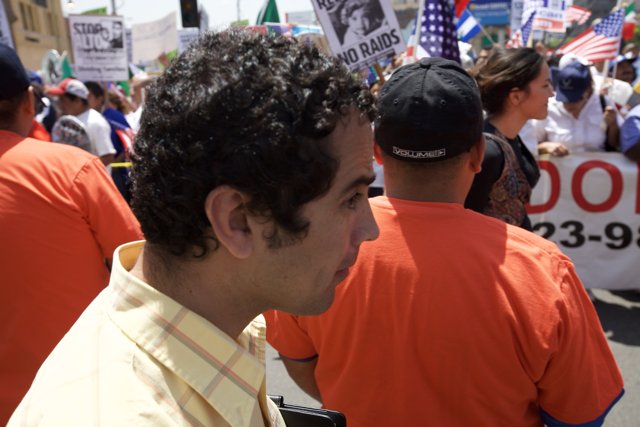 Curly Haired Man Joins the Mayday Rally