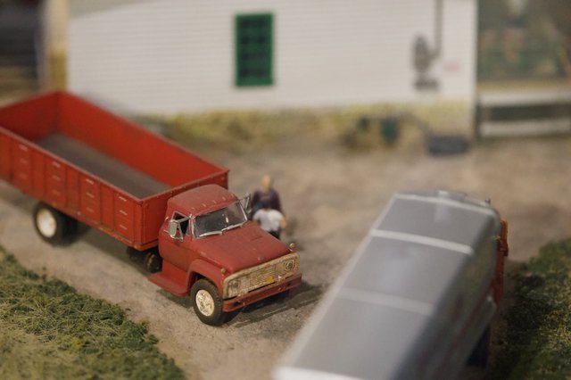 Weathered Red Grain Truck at Model Farm Scene