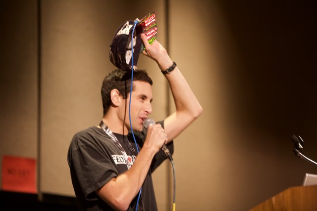 Microphone in Hand, Hat on Head