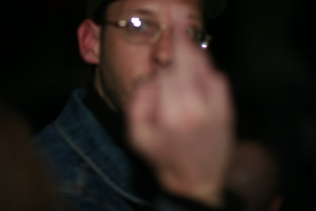 Blurry-Eyed Man with Glasses