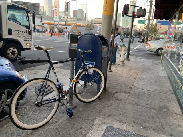 Parked Bicycle on Sidewalk