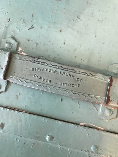 Company Nameplate on a Rusty Metal Plate
