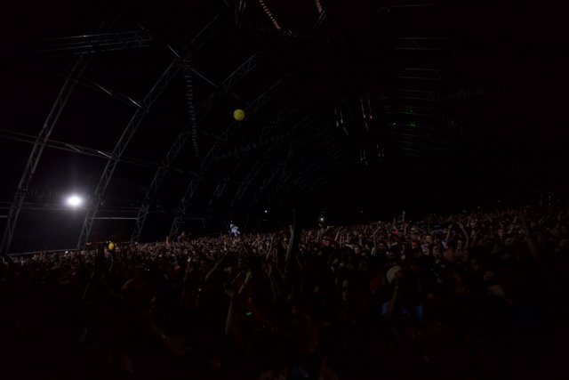 Yellow Balloon in a Sea of People