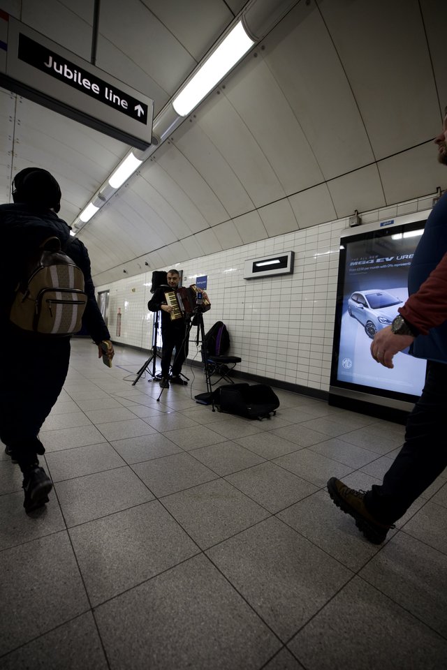 Street Musician Performing in London Underground Station