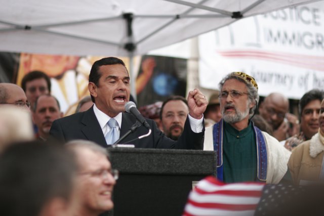 Antonio Villaraigosa Speaking at a Rally with the American Flag