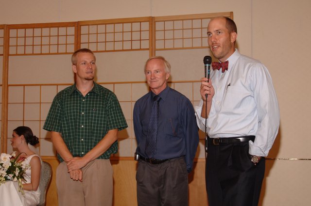 Wedding Reception Toast with Three Men Speaking