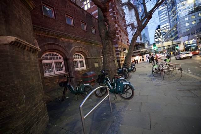 Urban Twilight: Bike Share Station in Historic London