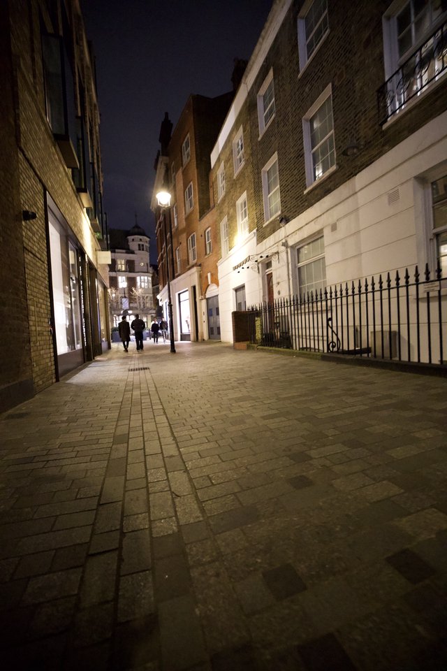 Illuminated Victorian Street Scene at Night in London