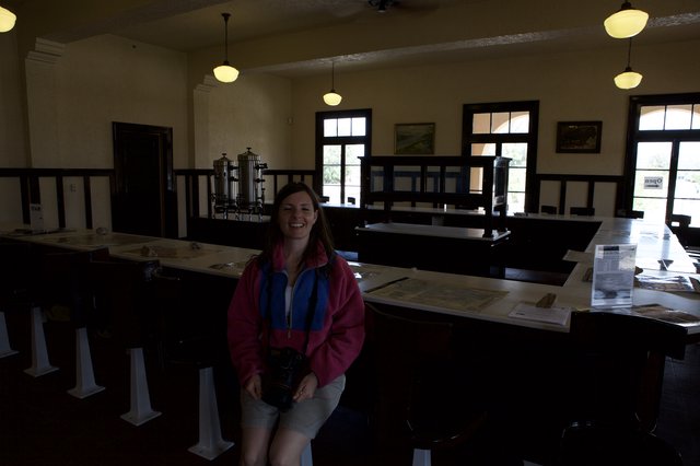Smiling Visitor Inside a Desert Park Visitor Center
