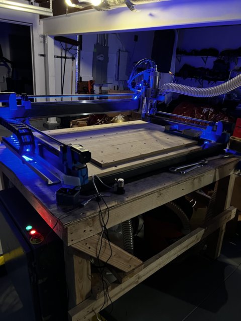 The Blue-Lit Machine at the Manufacturing Workshop