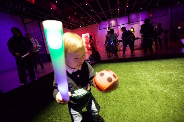 Child with Glow Stick at Baby Rave Event