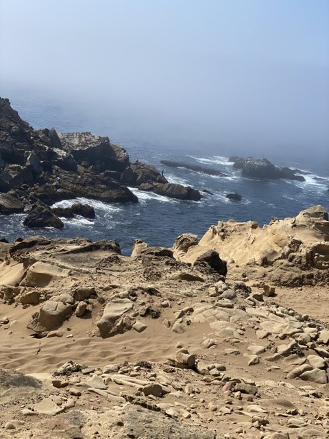 A Breathtaking View of the Ocean and Rocks from Jenner Cliffs