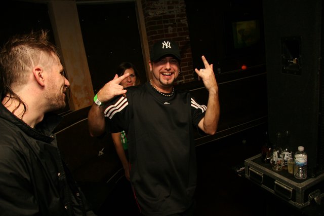Backstage Laughs with Friends at Nightclub Event