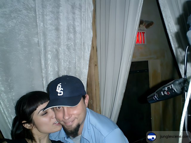 Kissing in the Photo Booth