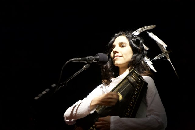 PJ Harvey Performs with a Guitar and Headdress at Coachella 2011