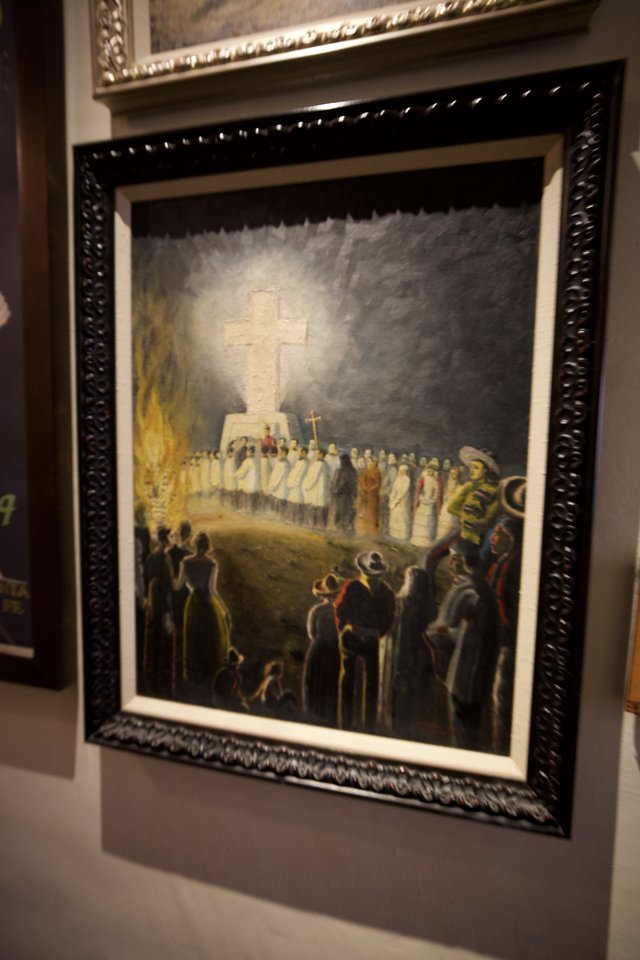 Religious Ceremony Painting with Illuminated Cross and Gathered Congregation