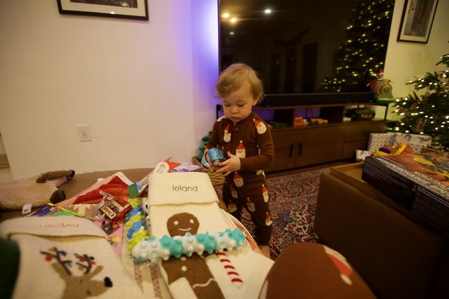 Toddler's First Christmas Morning with Gingerbread Person Cake