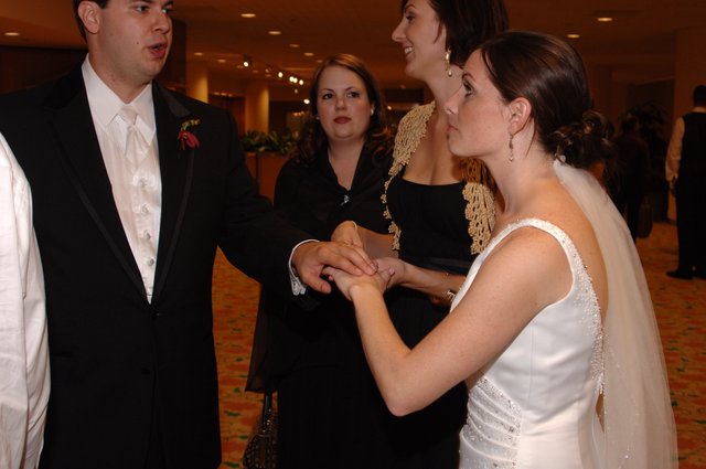 Bride and Groom Exchange Rings at Wedding Ceremony