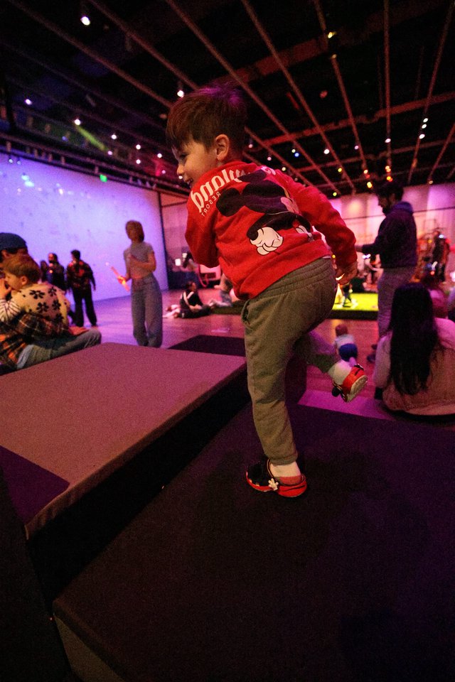Young Child Dancing at Baby Rave Event