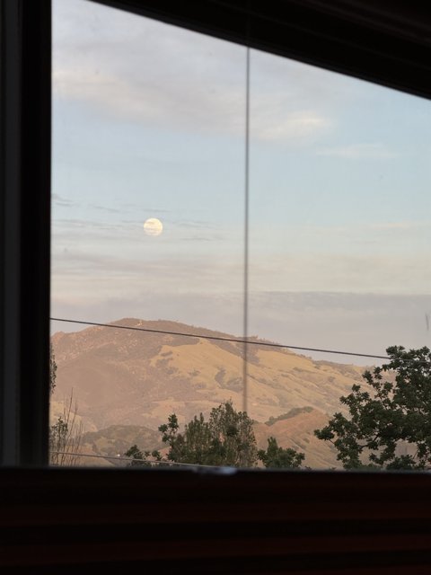 Moonlit Hills at Dusk