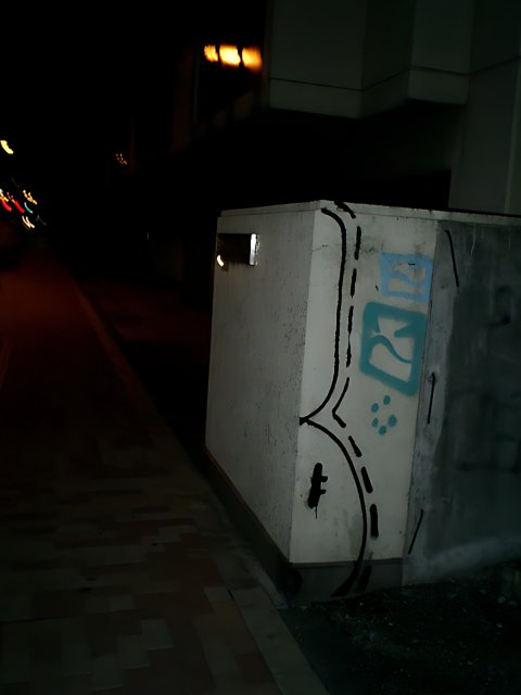 Graffiti Box on Tokyo Sidewalk
