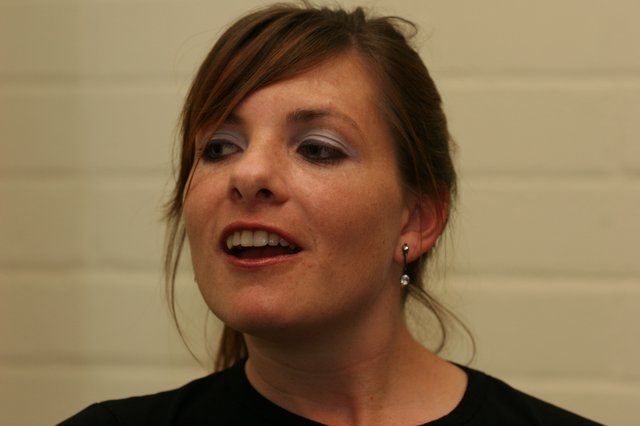 Candid Portrait of a Woman Mid-Conversation