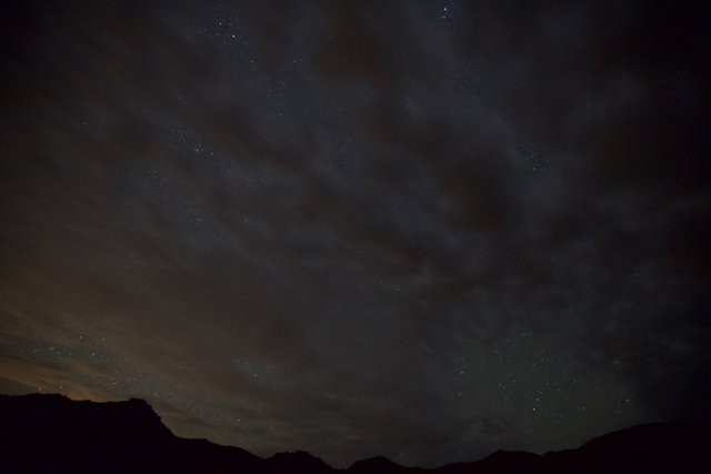 Starry Night Sky with Nebula Clouds