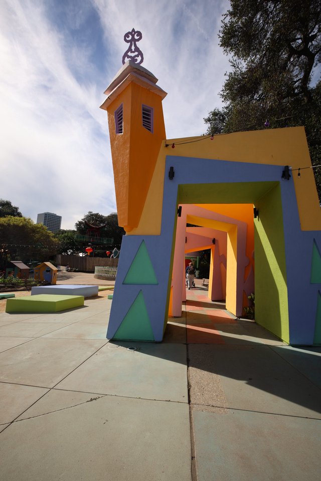 Colorful Whimsical Gateway with Bell Tower at Fantasyland