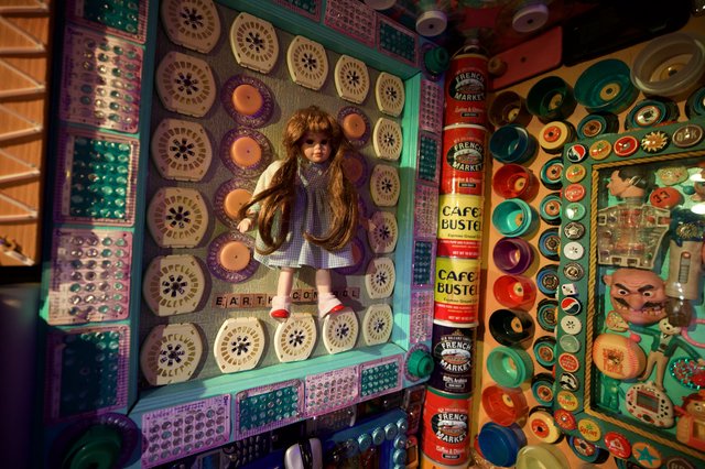 Vintage Doll Display in Eclectic Button and Found Object Art