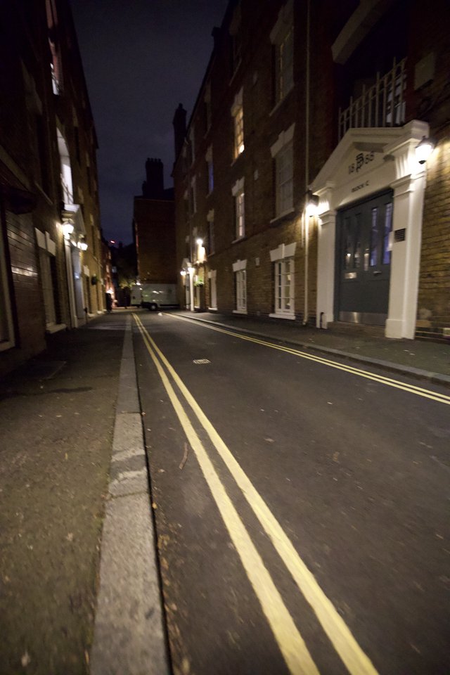 Quiet London Street Illuminated at Night