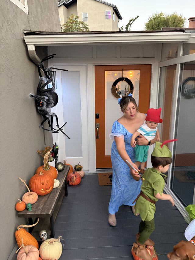Halloween Family Moment on Decorated Front Porch