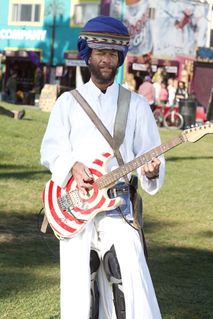 Turbaned guitarist performs in the great outdoors