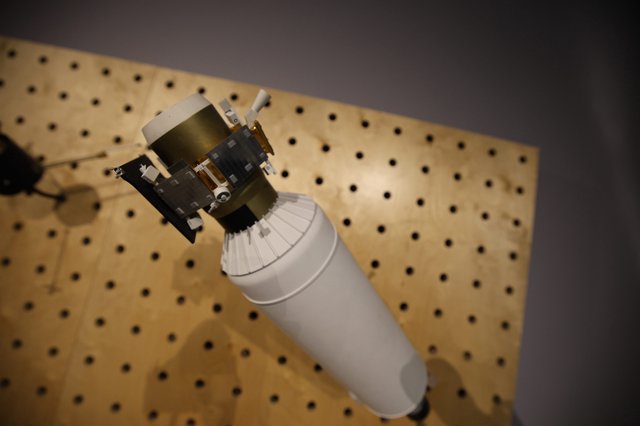 Apollo-Era Spacecraft Model on Pegboard Display