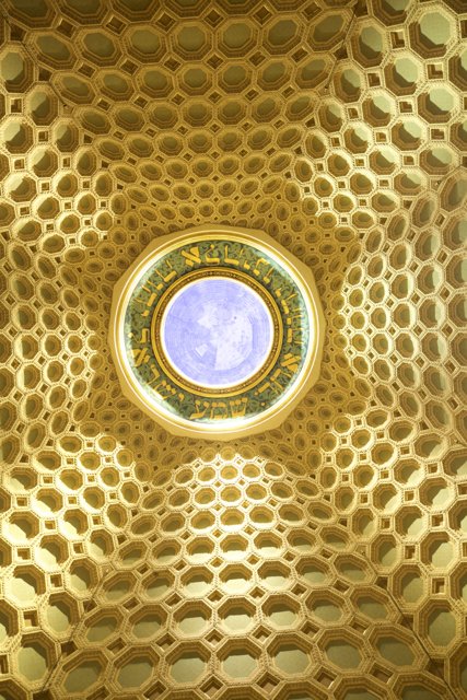 Golden Fractal Patterns in the Museum's Dome