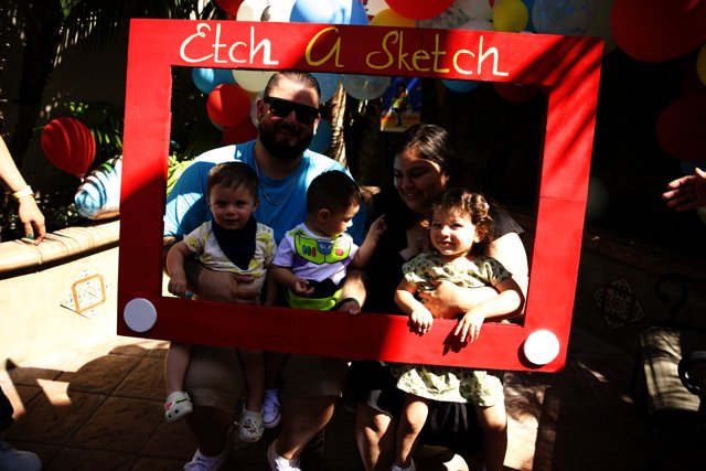 Red Frame Family Portrait at Wesley's First Birthday Party