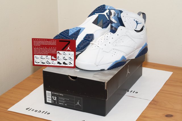 Air Jordan 7 Retro Blue/White Shoes in a Carton