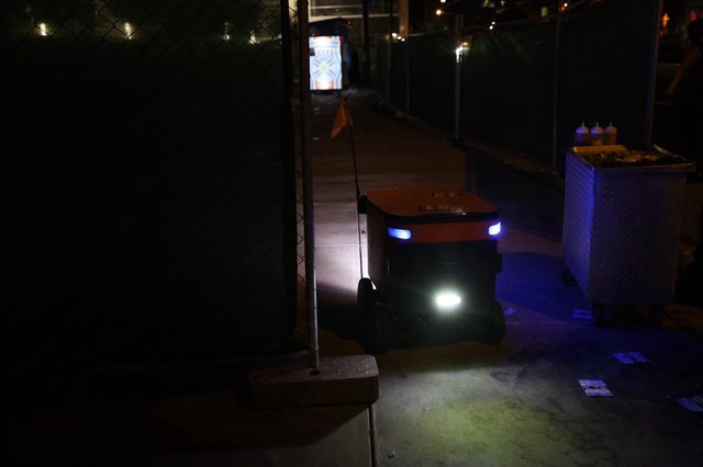 Autonomous Delivery Robot Navigates Festival Grounds at Night