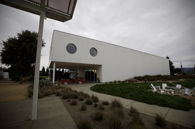 Modern Winery Architecture Under Cloudy Skies