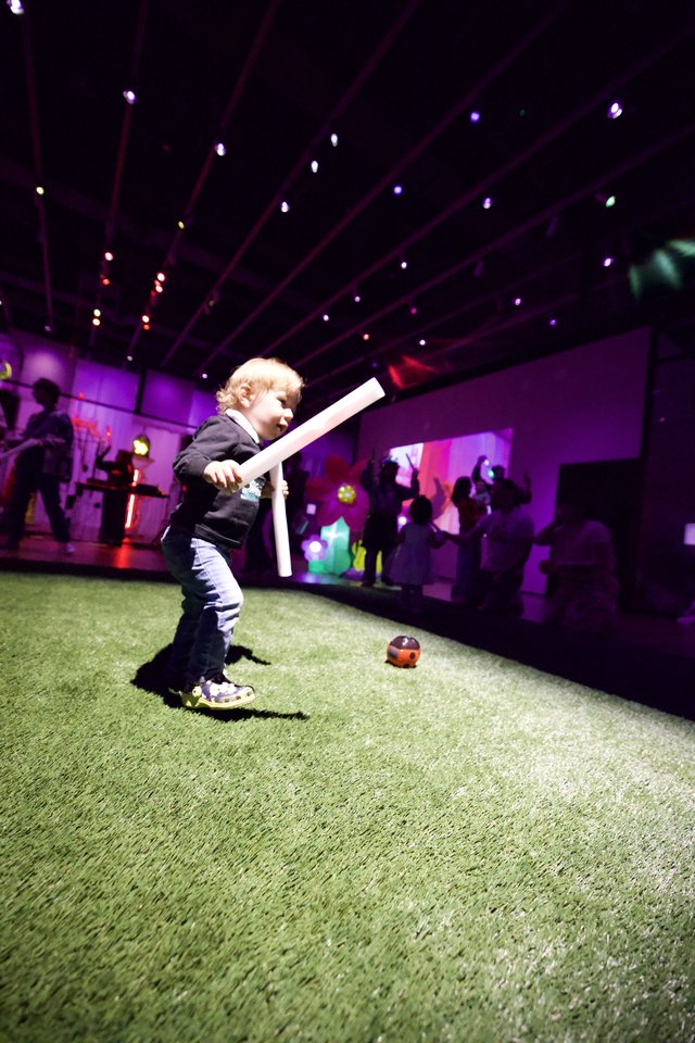 Child Playing at Baby Rave Interactive Art Installation