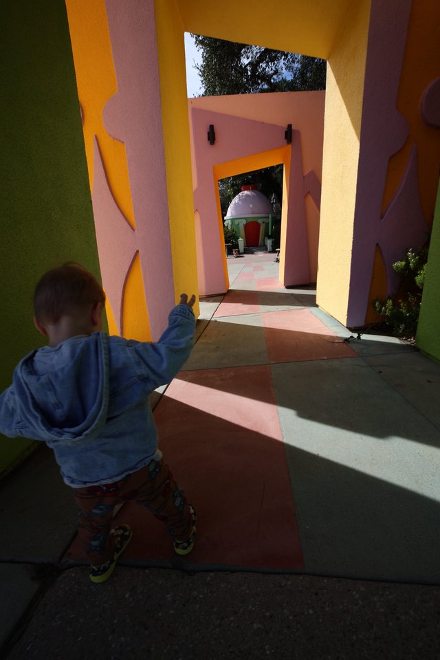 Child Exploring Colorful Architecture at Fantasyland