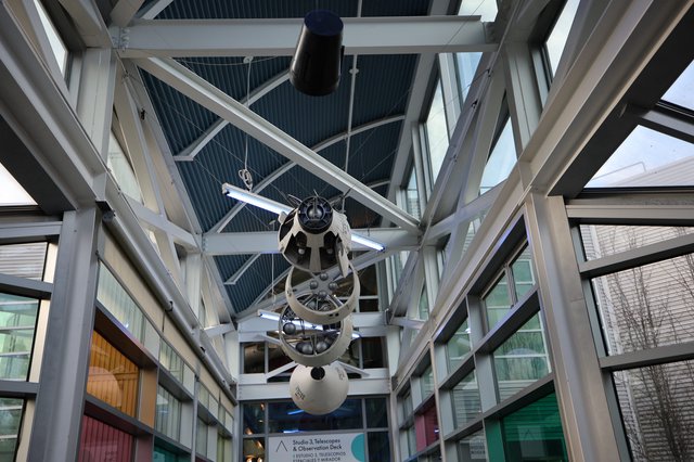 Suspended Satellite Model in Glass Atrium Observatory