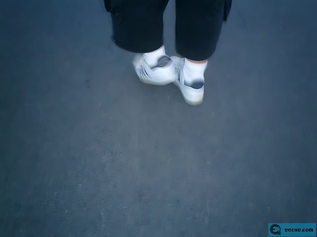 A Walk in Black Pants and White Sneakers