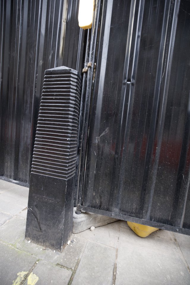 Urban Gate with Ventilation Grille and Yellow Debris