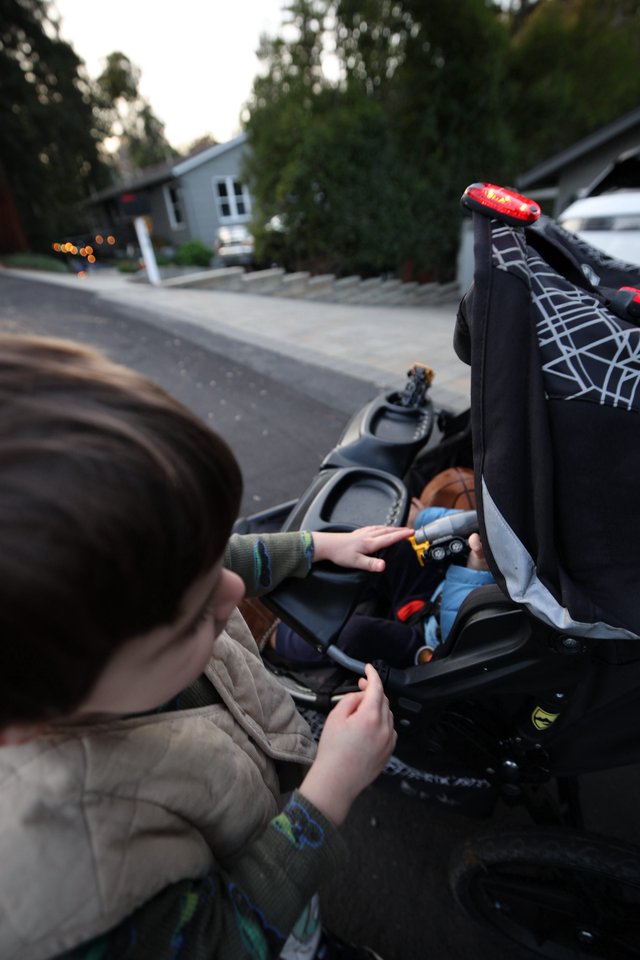 Evening Walk with Child in Stroller