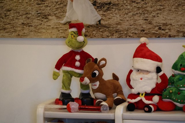 Whimsical Christmas Display with Grinch and Holiday Characters