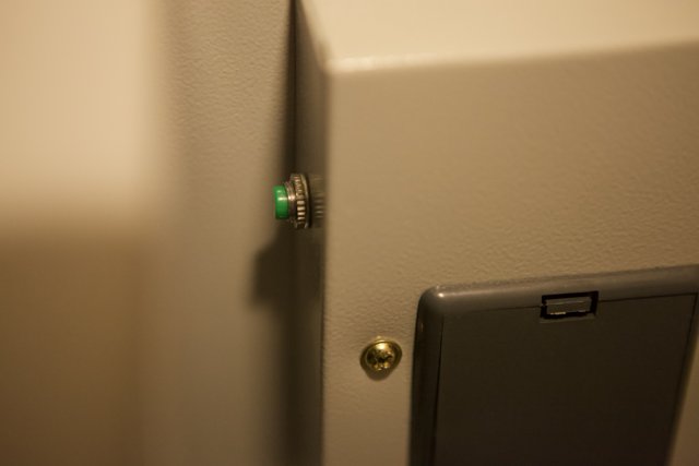 Green Light on Bathroom Door