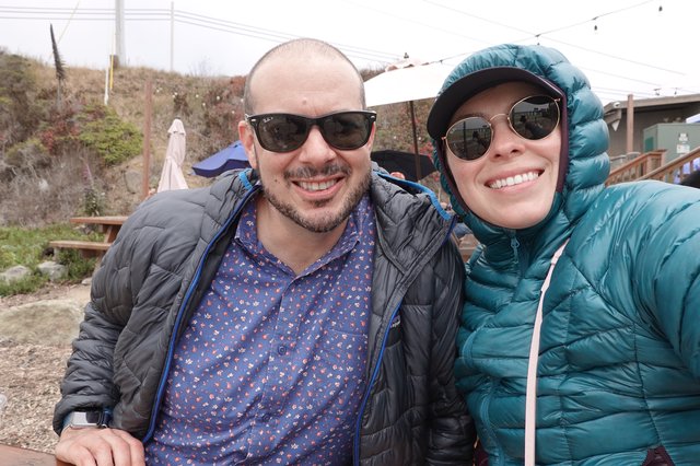 Happy Couple in Winter Jackets Outdoors