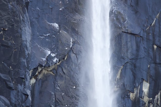 Yosemite Waterfall Cascading Through Granite Cliffs in Winter