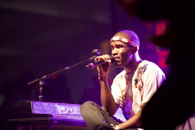 Frank Ocean performs solo on stage