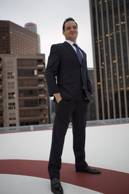 The Sharp Dressed Businessman atop a Los Angeles Skyscraper